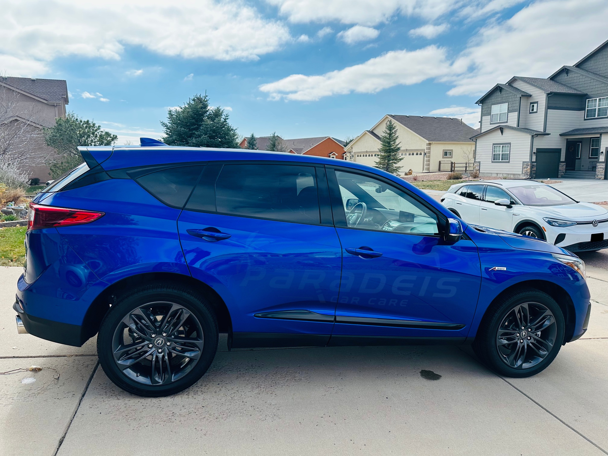Blue Acura RDX detailed by Paradeis Car Care, passenger-side profile